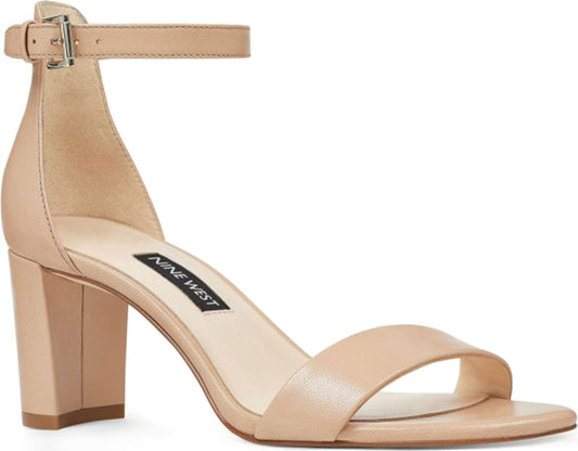 Beige high heel dress shoe with ankle strap and Nine West logo.