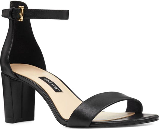 Black high heel sandal with ankle strap and gold buckle.