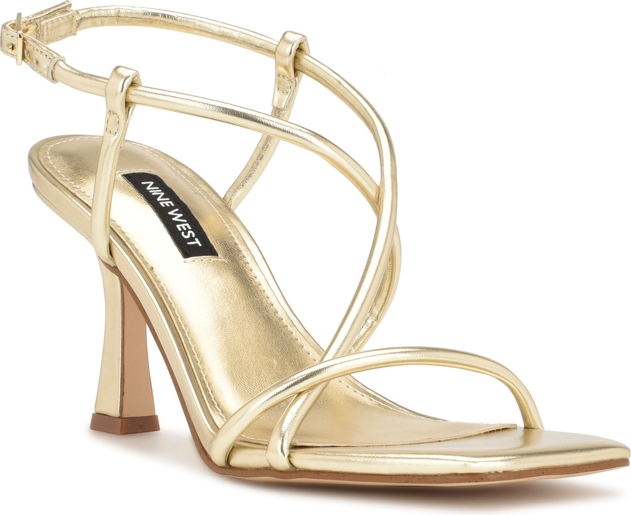 Gold high heel sandal with ankle strap and thin crossover straps. The brand name NINE WEST is printed on the insole.