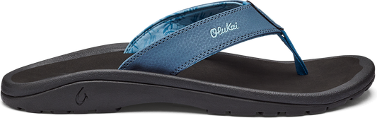 A blue flip-flop with black sole.