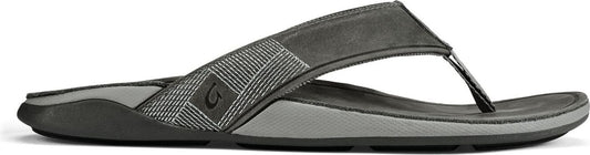A gray sandal with geometric pattern on the strap.