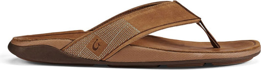 A brown sandal with a toe post.