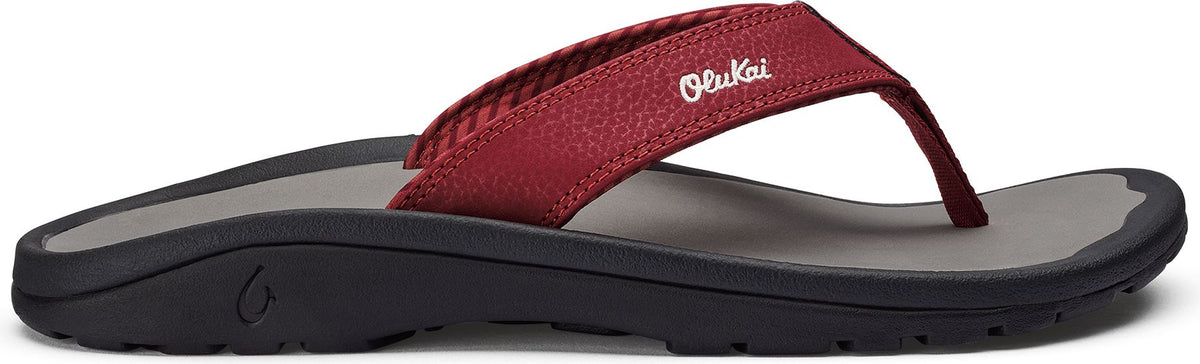 A red flip-flop with a gray insole and black sole.