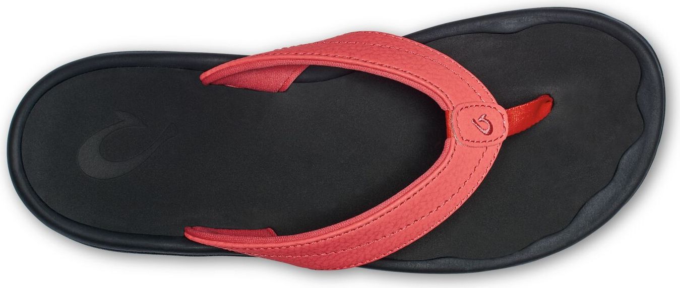 A black flip-flop with a red strap.