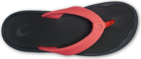 A black flip-flop with a red strap.
