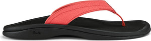 Coral flip-flop with a black sole.