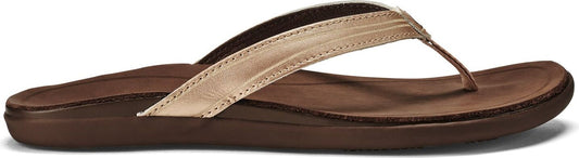 A brown leather sandal with tan straps.
