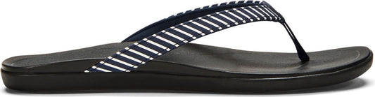 A flip-flop with a navy and white striped strap.