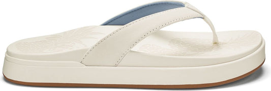 A cream-colored platform flip-flop with a light blue lining.