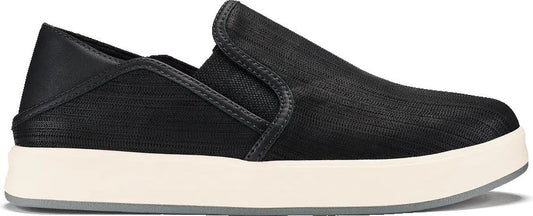 A slip-on sneaker with a black upper and white sole.
