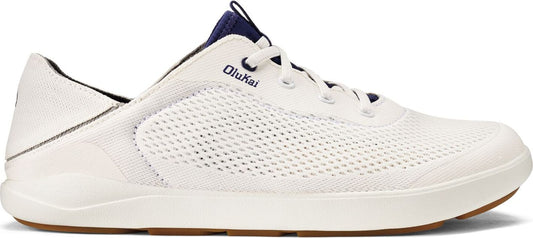 A white OluKai lace up sneaker, side view.