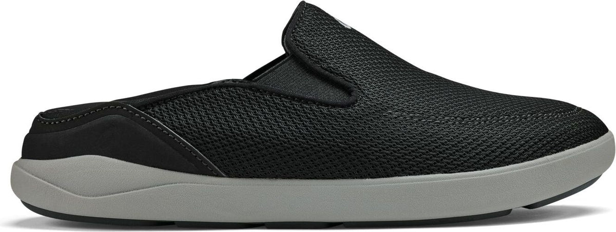 A black slip-on shoe with a gray sole.