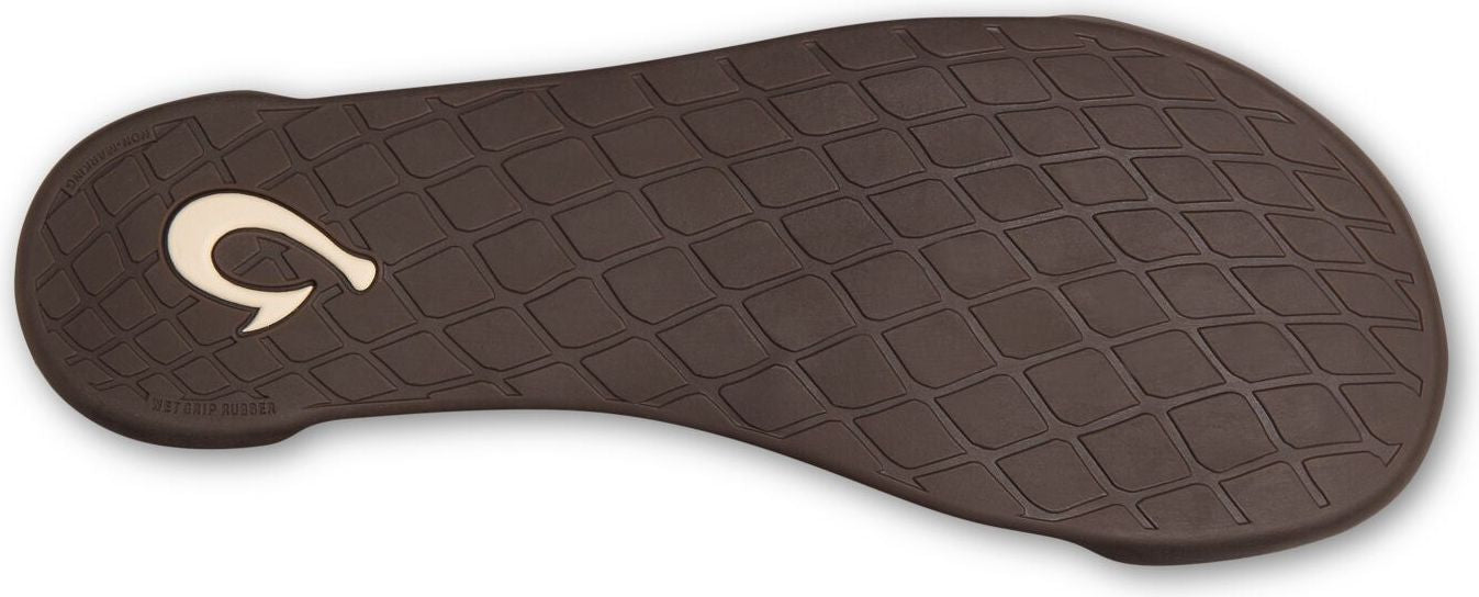 Brown textured sandal sole with a beige hook logo near the heel.