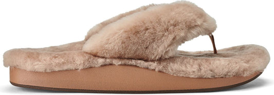 A fuzzy flip-flop with a tan sole.