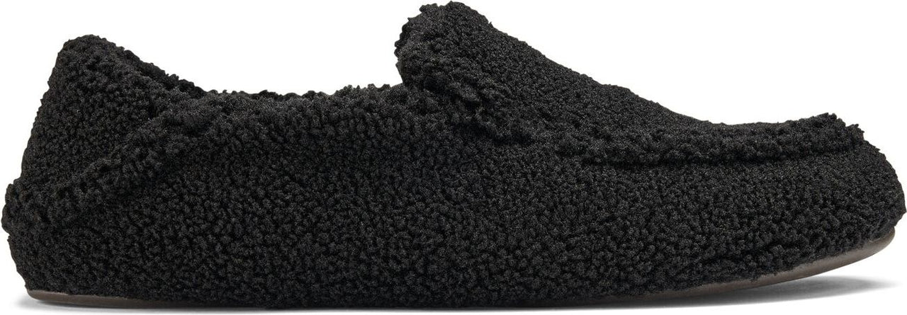 A black, fluffy slipper.