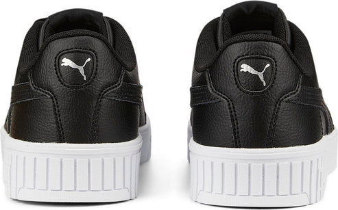 Back view of a pair of black sneakers with white platform soles and silver logo.