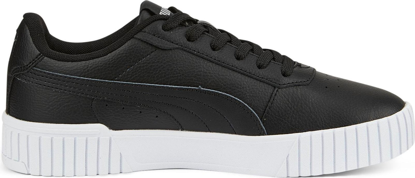 A black Puma sneaker with white soles.