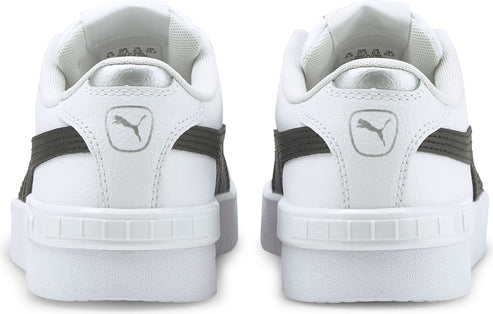 A pair of white platform sneakers, seen from the back, with gray Puma logos.