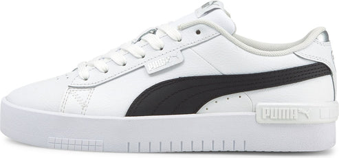A white leather sneaker with a black stripe and white laces.