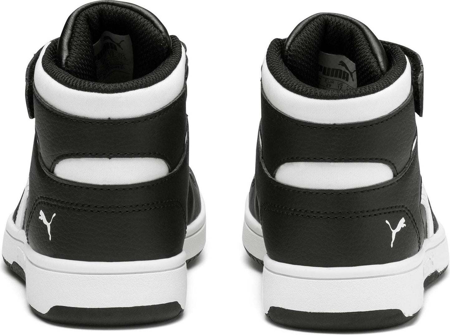 Rear view of black and white high-top sneakers with strap and logo.