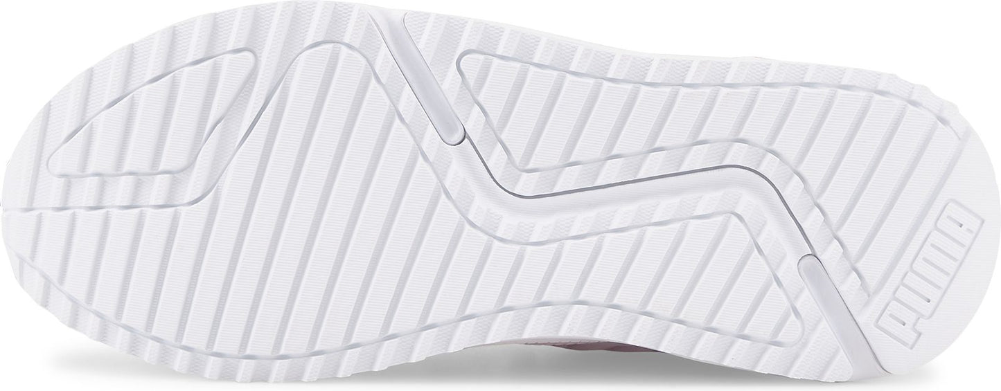 The bottom of a white sneaker with a ridged design and the word "PUMA" on the right side.
