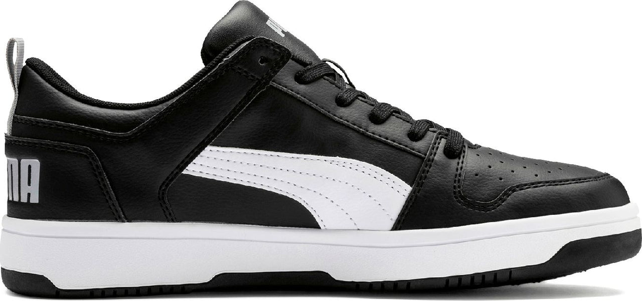 A black and white sneaker with the letters 'PUMA' on the back.