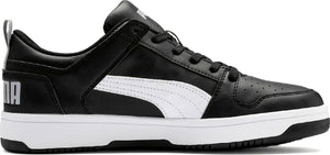 A black and white sneaker with the letters 'PUMA' on the back.