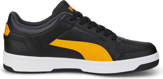 Black and gold low top sneaker with white sole.