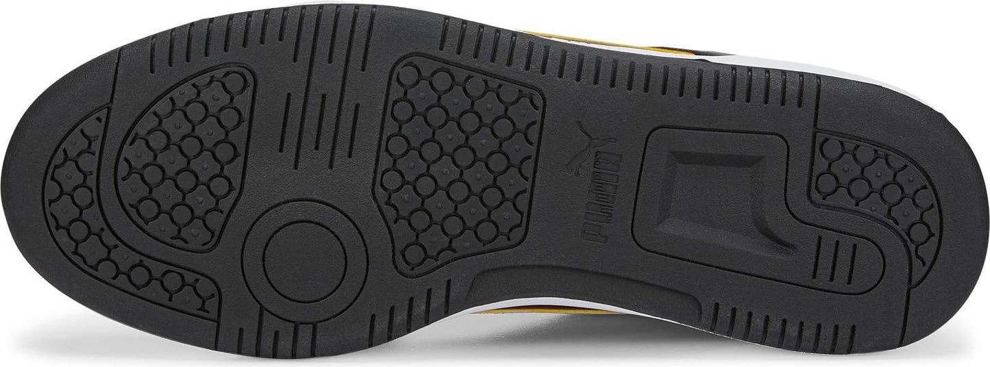 Black sneaker outsole with Puma logo and distinct traction patterns.