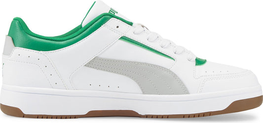 White sneaker with green accents and brown outsole.