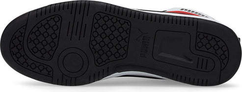 Black outsole with a geometric pattern and circular accent.