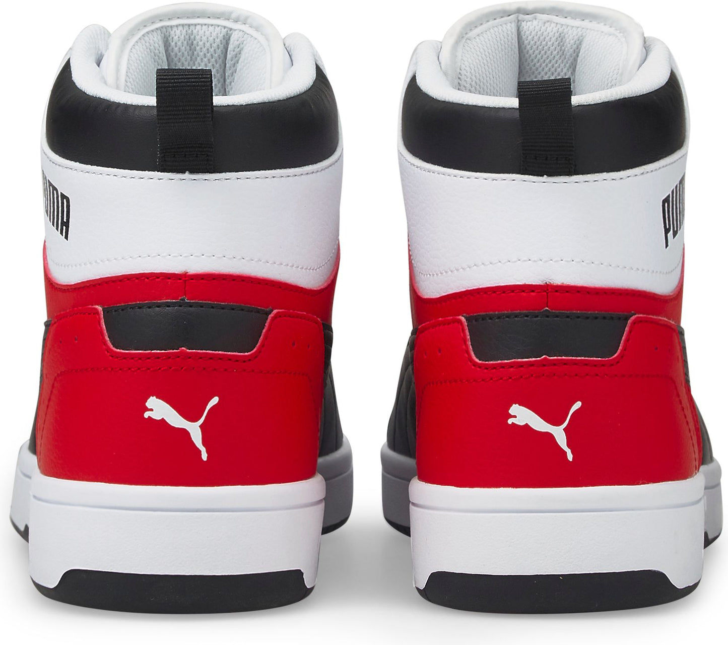 Rear view of two high top sneakers with red, white, and black color blocks, and "PUMA" on the upper.