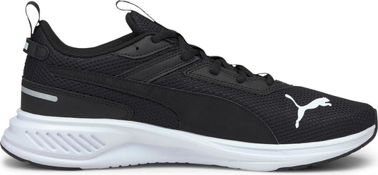Black athletic shoe with a white sole and white Puma logo.