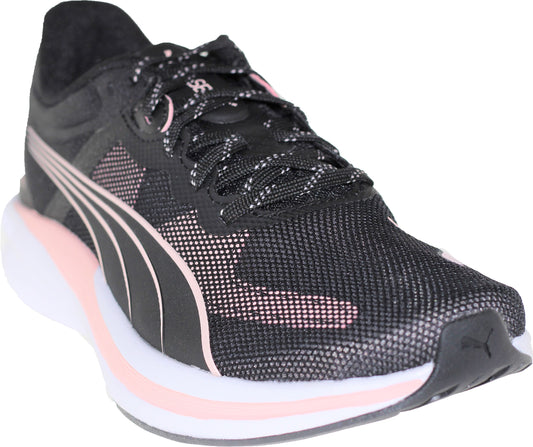 Black sneaker with pink accents, white sole, and black laces.