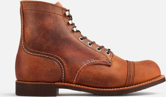 Brown leather boot with capped toe and laces.