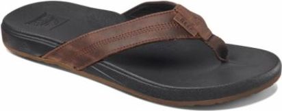 A brown leather sandal with a black sole.