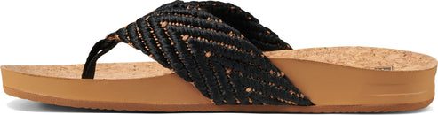 A women's sandal with black woven strap and tan sole.