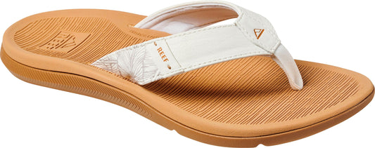 A tan sandal with a white strap.