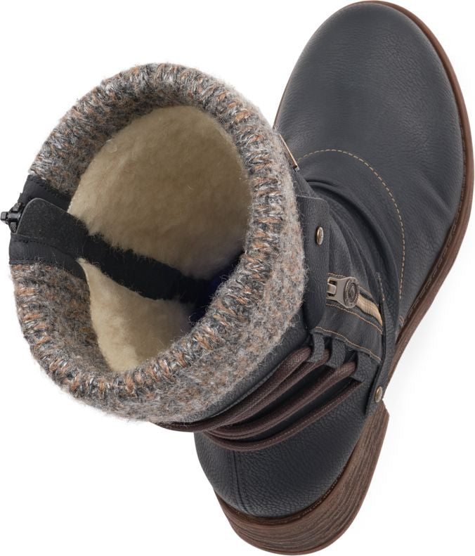 Black ankle boot with wool-blend lining, zipper, decorative strap and textured sole.