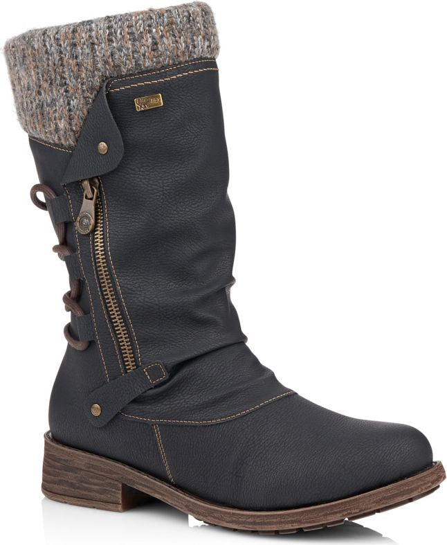 Mid-calf black boot with sweater cuff, side zip and lacing detail.