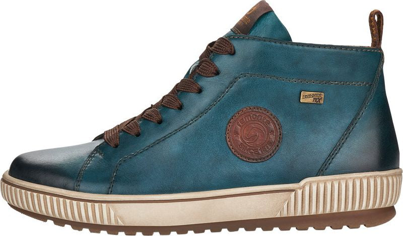 Ankle high blue leather sneaker with brown laces and tan rubber sole.