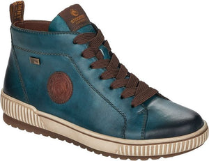 High-top sneaker with brown laces, blue distressed leather, round logo, and tan sole.