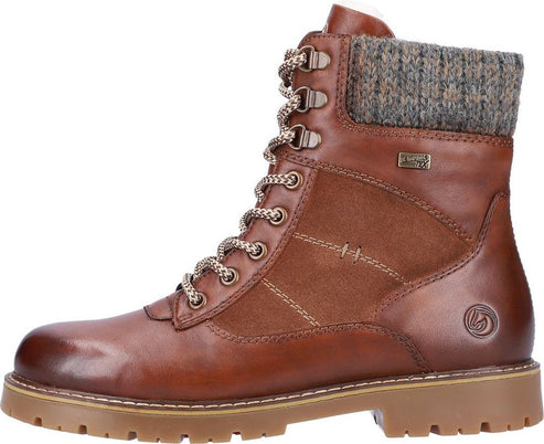 Brown leather lace-up boot with fabric cuff and lug sole.