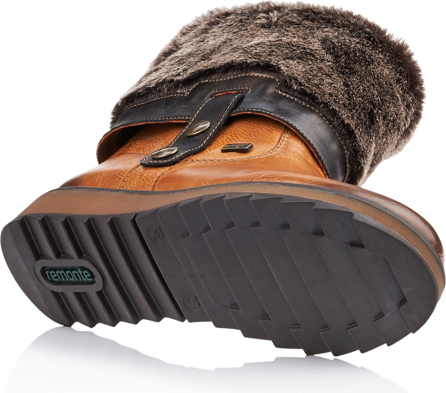 Tan leather boot with dark faux fur trim and lug sole.