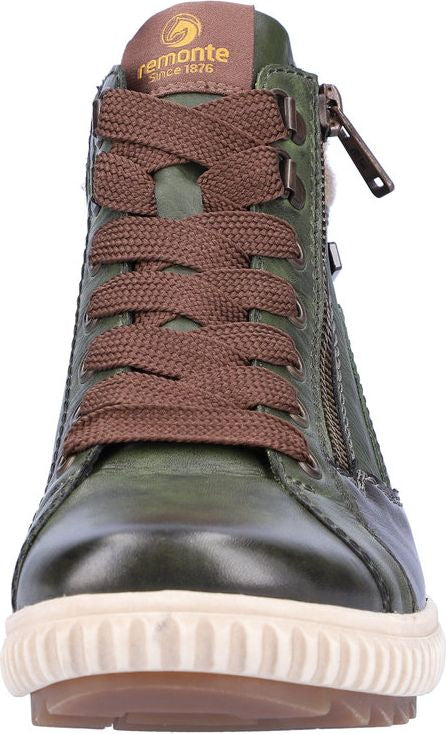 Olive-green ankle boot with brown laces, side zipper, and off-white ridged sole; 'remonte since 1876' on tongue.