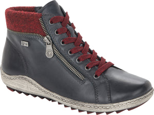 Low top boot with dark gray upper, a red cuff, a zipper and maroon laces.