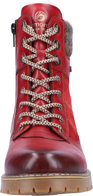 Red lace-up ankle boot with zip closure, and lug sole.