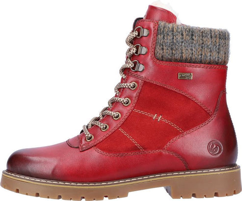Red lace-up boot with a knit collar and lug sole.
