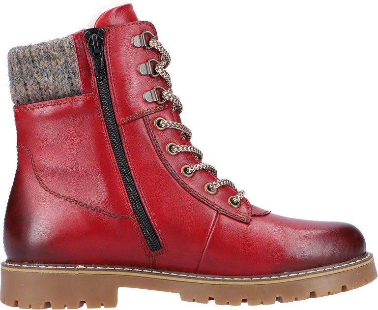 Red leather combat boot with zipper, faux fur lining, and tan treaded sole.