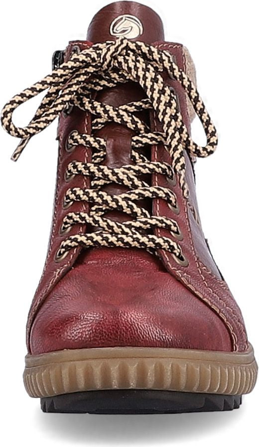 Burgundy lace-up ankle boot with brown and white laces and a brown rubber sole.
